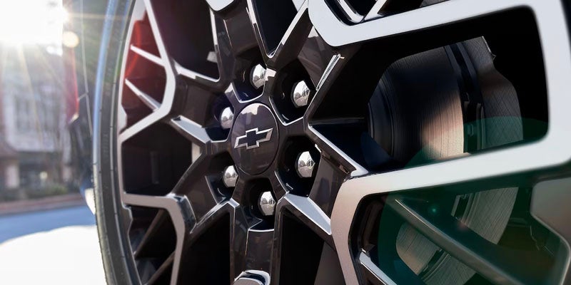 A black and silver alloy wheel on the Chevrolet Blazer